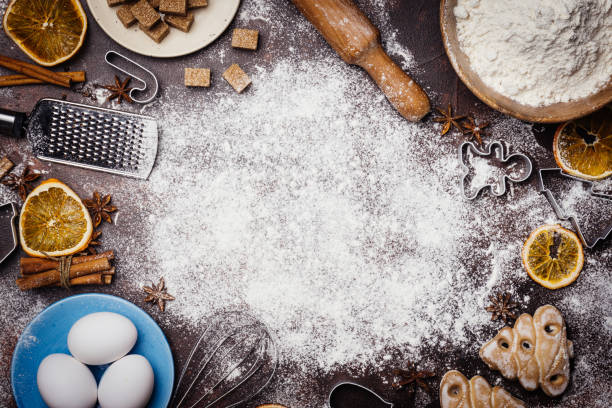 istock Christmas Baking background. Ingredients for cooking christmas baking (flour, eggs, sugar, spices) on dark background. Copy space. Christmas mood. 1080666240