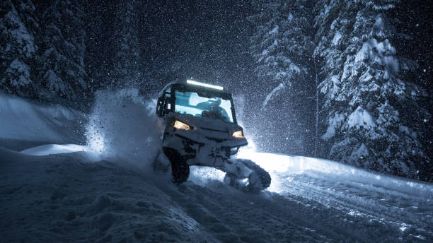 UTV with tracks in powder snow