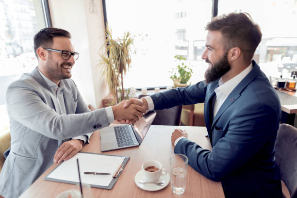 istock Teamwork concept.Two businessman working together on new project 1080698172