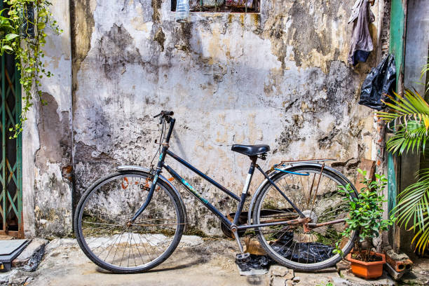 istock Vintage old bycicle on the street 1080701664
