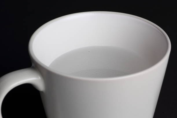 istock A cup of water with a black ground 1080714140