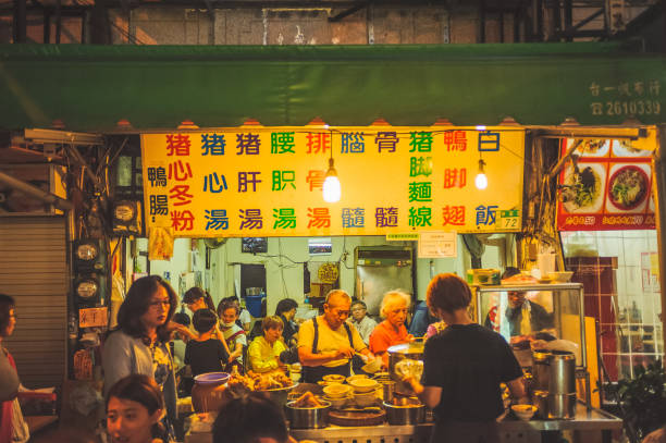 Kaohsiung, Taiwan - Jun 13, 2018 : The local people eat snack on the Night market.