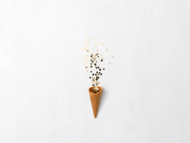 istock new year background with ice cream cone and new year items on white background 1080721582