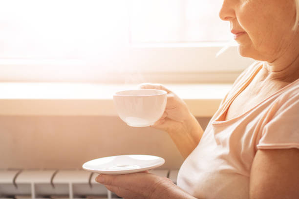 istock Woman and coffee in hands 1080723924