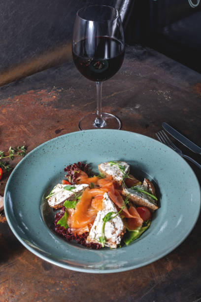 istock salad with salmon and cheese toasts 1080724070