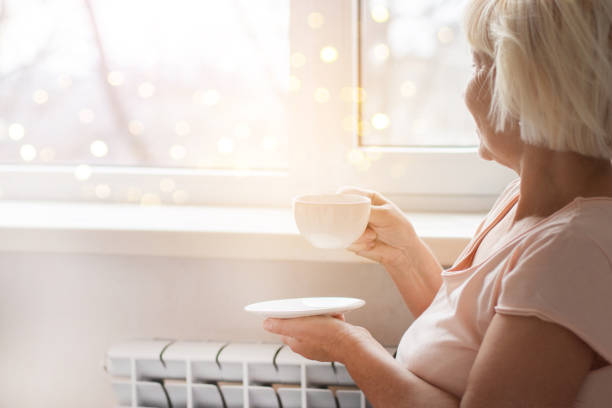 istock Woman hands holding a hot coffee 1080724246
