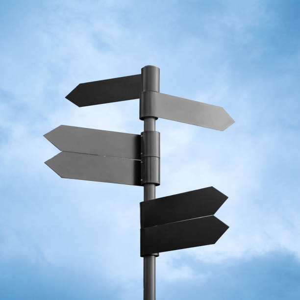 istock Empty dark metal signpost isolated on sky background 1080739628