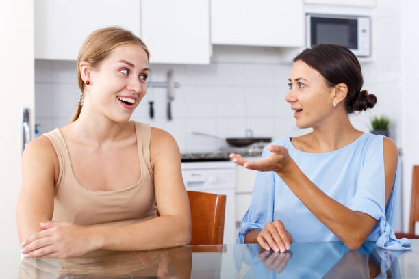 istock Two friendly girls having emotional conversation 1080740074