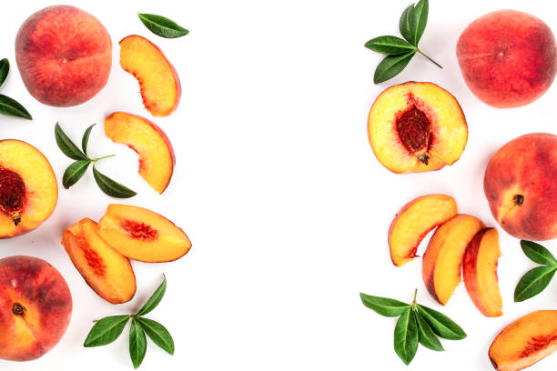 istock ripe peaches with leaves isolated on white background with copy space for your text. Top view. Flat lay pattern 1080740974