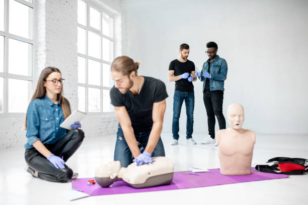 istock Group of young people during the first aid training 1080740986