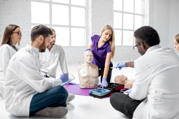 istock Group of medics during the first aid training indoors 1080741498