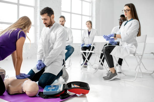 istock Group of medics during the first aid training indoors 1080741942