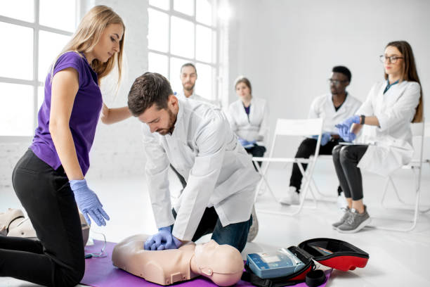 istock Group of medics during the first aid training indoors 1080742004