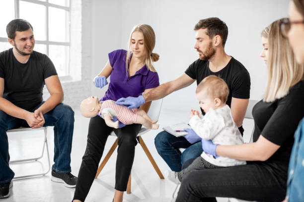 istock Group of people during the first aid training 1080744618