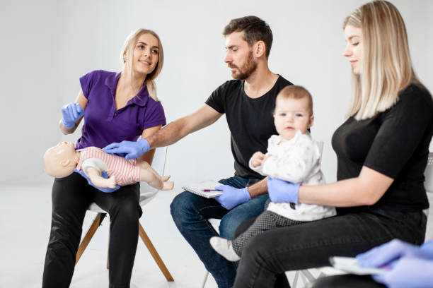 istock Group of people during the first aid training 1080744704