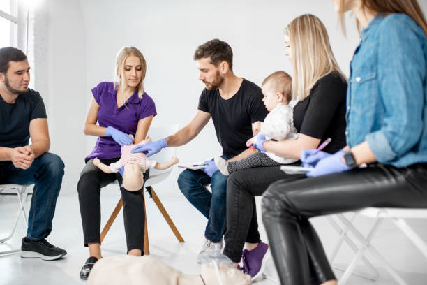 istock Group of people during the first aid training 1080744710