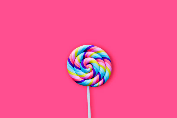 istock Sweet lollipop on pink background 1080745126