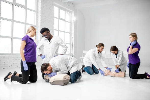 istock Group of medics during the first aid training indoors 1080745492