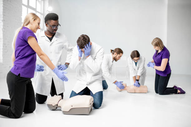 istock Group of medics during the first aid training indoors 1080745562