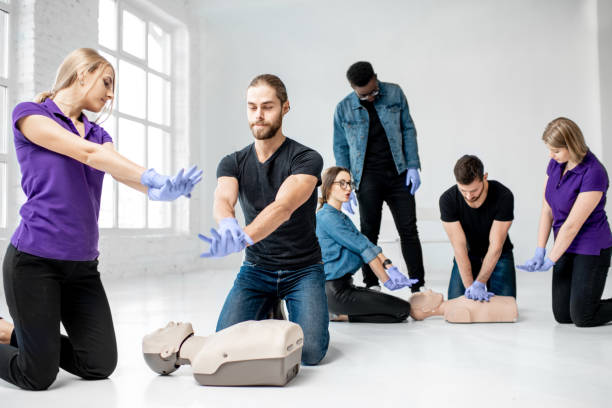 istock Group of people during the first aid training 1080745636