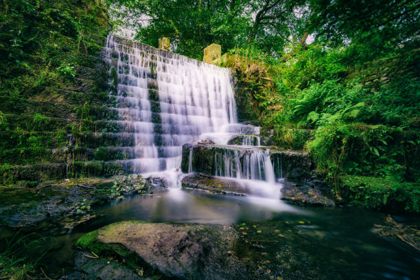 istock waterfalls and sunrise at peak district 1080746088