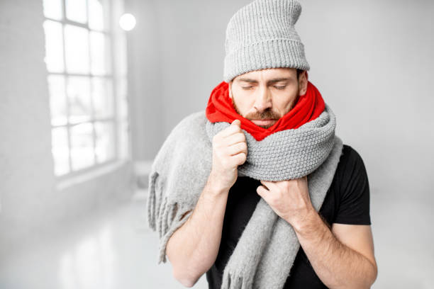 istock Man feeling cold having a winter disease 1080746656
