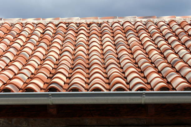 istock New red and white roof tiles 1080758860