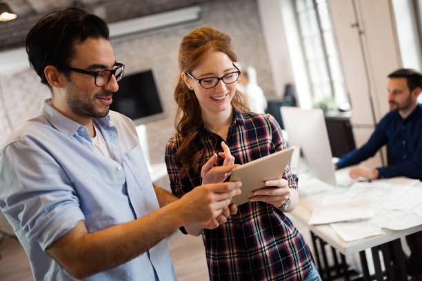 istock Portrait of young architects discussing in office 1080759896