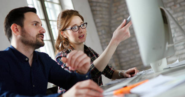 istock Portrait of young designers working on computer 1080760778