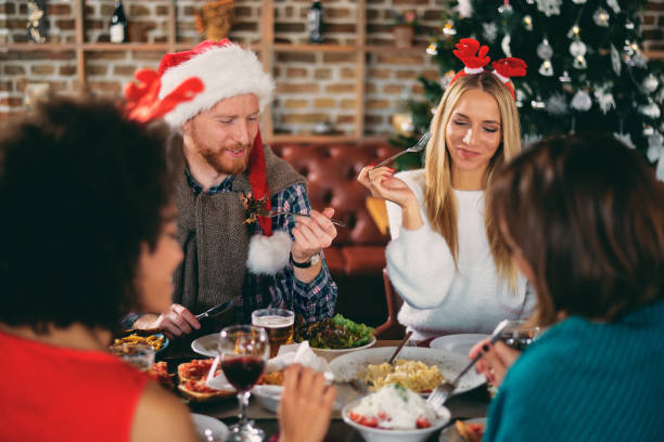 istock Friends having dinner at home at Christmas eve. 1080761126
