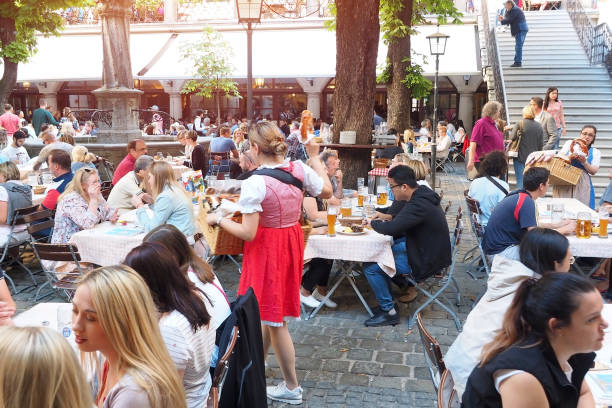 many of tourists and local people at famous and biggest german beer restaurant name hofbrauhaus in munich city germany - oktoberfest beer munich german culture imagens e fotografias de stock