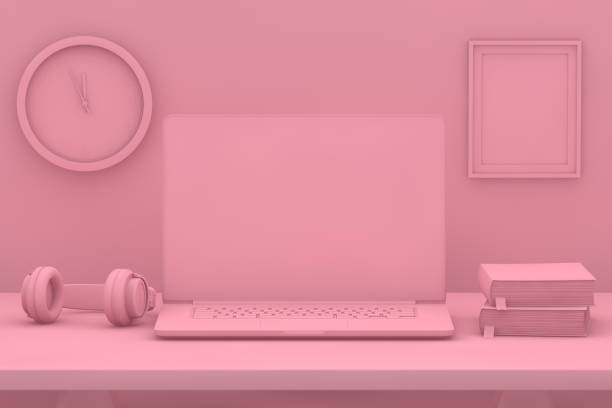 istock Laptop with blank screen on desk with pink background 1080764208