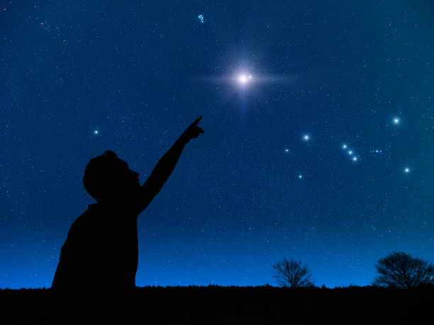 istock Man pointing at the starry night sky. Elements of this image are my work. 1080775538