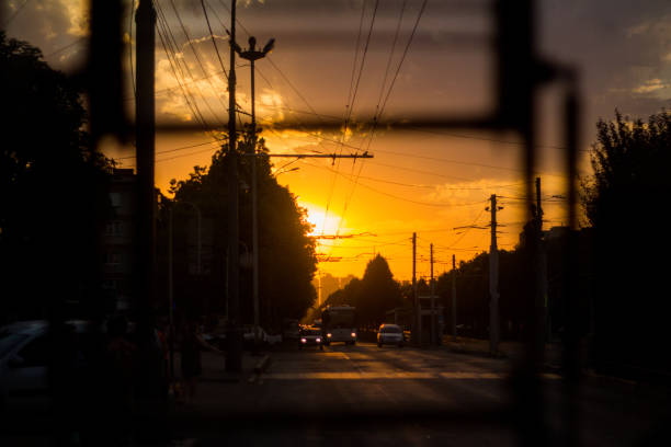 Sunset light coming through the front of the bus.