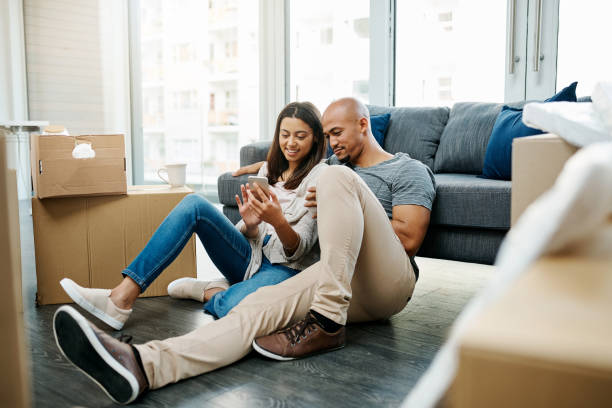 istock Let's invite some people over to help us unpack 1080782648