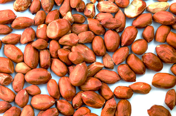 istock Dried and beautifully lying peanuts on a white background. 1080784038
