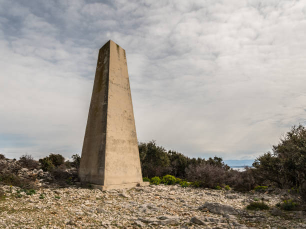 istock Old concrete triangular pillar on the island of Cres 1080791824