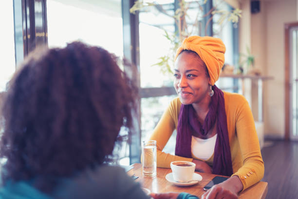 istock Two African female students on a coffee break 1080793836