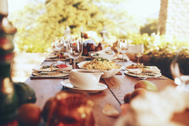 Shot of a nicely set table with all kinds of food on it for a lunch party