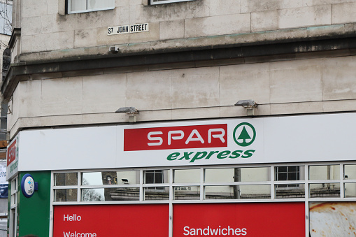Cardiff, United Kingdom - December 01, 2018: The Spar Express supermarket sign in Saint John's Street in Cardiff, United Kingdom