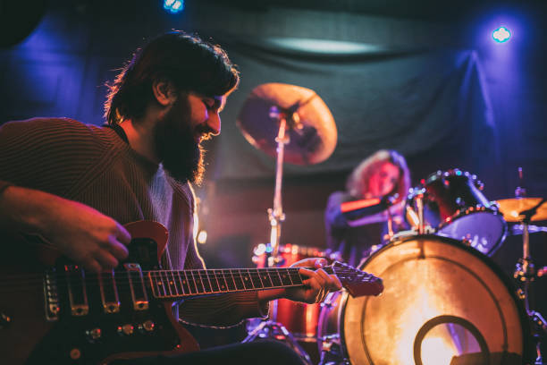 istock Band of two performing 1080831352