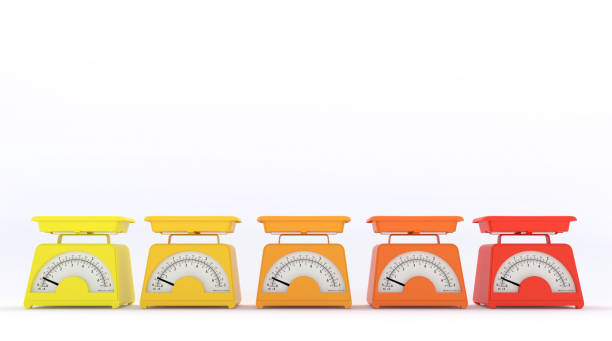 Old kitchen scales of different colors isolated on white background with free space for text or logo. Copy space.