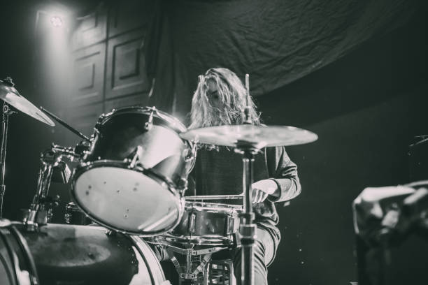 istock Girl playing drums 1080835000