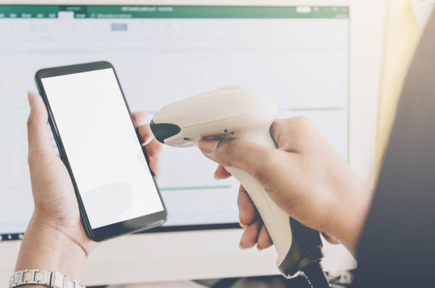 istock Concept of shopping and human hands are holding smartphone with barcode reader. 1080838110