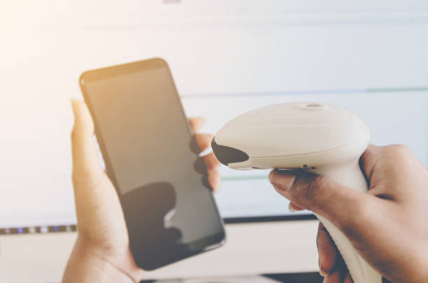 istock Concept of shopping and human hands are holding smartphone with barcode reader. 1080838504