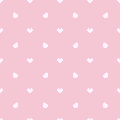 Seamless pink texture with scattered hearts. Valentine's Day backdrop. Vector Illustration.