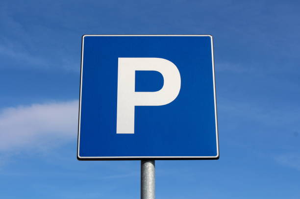 istock Parking sign with cloudy blue sky background 1080857014