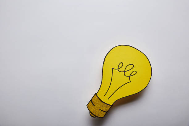 istock top view of light bulb idea symbol on grey background 1080859048