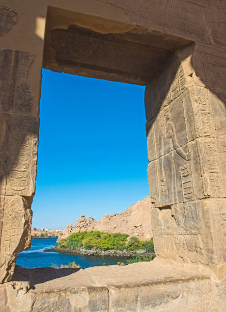 istock Hieroglyphic carvings on wall at window in an ancient egyptian temple 1080872368