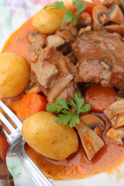istock Veal stew served with sauce and steamed potatoes 1080878014